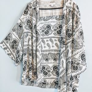 Sheer, soft ly feminine accented in gold cover up